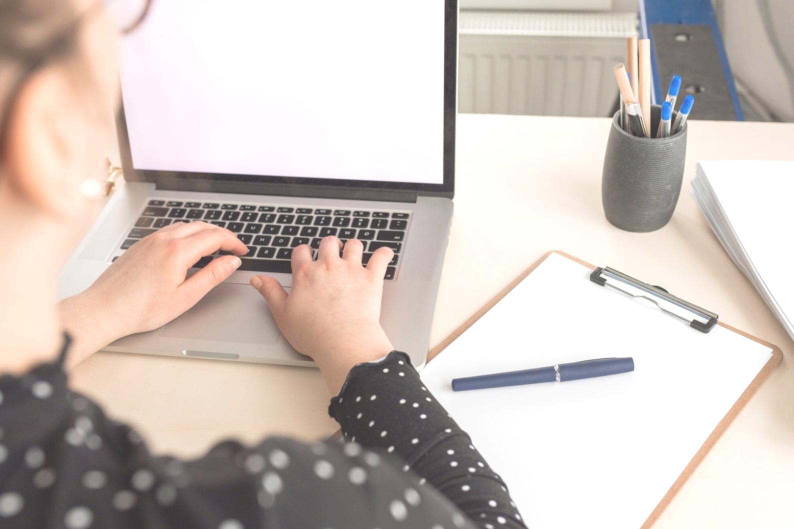 Students engaged in interactive learning session with financial charts and market analysis materials